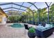 Beautiful screened-in pool and outdoor lounge area, ideal for entertaining and relaxation at 7024 Brier Creek Ct, Lakewood Ranch, FL 34202