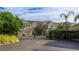 Savannah Preserve gated community entrance shows townhomes with attached garages and professional landscaping at 8043 St Simons St, Bradenton, FL 34201