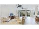Open living space with sliding glass doors to a patio and an airy atmosphere at 8043 St Simons St, Bradenton, FL 34201