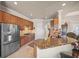 Kitchen with stainless steel appliances, granite countertops, and ample cabinet space at 8294 Barton Farms Blvd, Sarasota, FL 34240