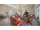 Spacious living room with tile floors and elegant furnishings at 8294 Barton Farms Blvd, Sarasota, FL 34240