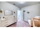 Bright Bedroom with a neutral palette, a crib, changing table, and decorative accents for a serene space at 9007 Royal River Cir, Parrish, FL 34219