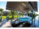 Private boat dock on a canal, offering easy access to waterfront activities at 9332 Miami Cir, Port Charlotte, FL 33981