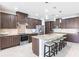 Modern kitchen with granite counters, stainless steel appliances, and ample cabinet space at 9332 Miami Cir, Port Charlotte, FL 33981