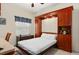 Murphy bed easily converts to a bed in this room at 9630 Club South Cir # 6208, Sarasota, FL 34238