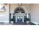 Exterior of the clubhouse with well manicured greenery and a covered entryway at 9630 Club South Cir # 6208, Sarasota, FL 34238