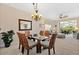 Elegant dining area adjacent to the living room, perfect for entertaining guests and Gathering meals at 9630 Club South Cir # 6208, Sarasota, FL 34238