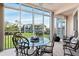 Spacious lanai offering stunning views of the golf course and community, ideal for outdoor relaxation at 9630 Club South Cir # 6208, Sarasota, FL 34238