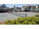 Enjoy a game of tennis on the community tennis court, surrounded by greenery at 9630 Club South Cir # 6208, Sarasota, FL 34238