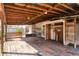 Inviting back porch offering wood decking and a roof, perfect for relaxing outdoors at 1004 12Th W Ave, Palmetto, FL 34221