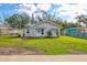 Charming home boasts a spacious front yard and peaceful neighborhood setting at 1004 12Th W Ave, Palmetto, FL 34221