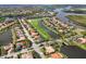 Stunning aerial view of the property, showcasing its prime location in a waterfront golf community at 10509 Winding Stream Way, Bradenton, FL 34212