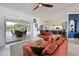 Open concept living space with a modern kitchen and inviting outdoor patio at 10509 Winding Stream Way, Bradenton, FL 34212