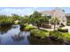 Beautiful waterfront property with lush landscaping and private dock at 121 Tidy Island Blvd, Bradenton, FL 34210