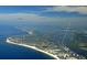 Aerial view of a coastal townhome community close to the beach and the Gulf of Mexico at 1249 Dockside Pl # 110, Sarasota, FL 34242