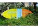 Siesta Key Village sign surrounded by green foliage at 1249 Dockside Pl # 110, Sarasota, FL 34242