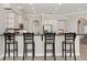 An eat-in kitchen with bar seating and stainless steel appliances provides a great space for cooking at 12622 Safe Harbour Dr, Cortez, FL 34215