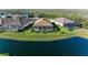 Homes in the community feature pools and screened-in patios overlooking the serene pond at 13630 Deep Blue Pl, Bradenton, FL 34211