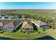 Community homes feature sparkling pools and backyard views of the water and forest at 13630 Deep Blue Pl, Bradenton, FL 34211