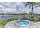 Community hot tub with a view of the lake and surrounding neighborhood at 13630 Deep Blue Pl, Bradenton, FL 34211