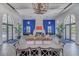 Bright and airy clubhouse lounge area with stylish decor, a fireplace, and comfortable seating at 13630 Deep Blue Pl, Bradenton, FL 34211