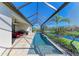 A large, screened-in pool offers a beautiful backyard and ample seating space at 13630 Deep Blue Pl, Bradenton, FL 34211