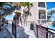 Beach condo with beautiful landscaping and pool with wash off before entering sign at 1760 Gulf Blvd # 603, Englewood, FL 34223