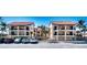 Stunning condominium complex boasts beautiful balconies, lush palm trees, and ample parking for residents and guests at 1760 Gulf Blvd # 603, Englewood, FL 34223