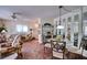 Warm and inviting living space with comfortable seating, dining area, and access to natural light at 1760 Gulf Blvd # 603, Englewood, FL 34223