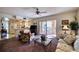 Inviting living room featuring balcony access, comfortable furniture, and seamless flow into the kitchen at 1760 Gulf Blvd # 603, Englewood, FL 34223