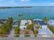 Beautiful waterfront property with mature trees, updated roof and paver driveway at 204 N Washington Dr, Sarasota, FL 34236
