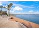 Expansive backyard with a wooden deck, and a view of the ocean for relaxation and enjoyment at 204 N Washington Dr, Sarasota, FL 34236