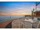 Outdoor dining area with serene water views at 204 N Washington Dr, Sarasota, FL 34236