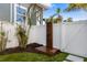 An outdoor shower is conveniently located in the backyard of this beautiful home at 211 81St St # B, Holmes Beach, FL 34217