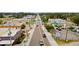 Aerial street view showcasing revitalized streetscape with new palm trees and pedestrian-friendly walkways at 29627 Niagara Ct, Englewood, FL 34223