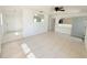 Inviting living room featuring tile floors, natural light, and seamless transition to other spaces at 3035 Pershing Ave, Sarasota, FL 34234