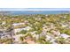 Expansive aerial view showcasing the beautiful neighborhood with glimpses of the sparkling waterfront at 3319 S Osprey Ave, Sarasota, FL 34239