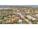 Overhead view of a neighborhood with tree-lined streets, showing a mix of residential and commercial properties at 3319 S Osprey Ave, Sarasota, FL 34239