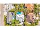 Aerial view of homes, showcasing backyard pools and neatly landscaped properties in a desirable neighborhood at 3319 S Osprey Ave, Sarasota, FL 34239