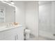 Modern bathroom featuring a glass-enclosed shower, stylish fixtures, and clean design at 3319 S Osprey Ave, Sarasota, FL 34239
