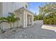 Elegant front porch with stately columns and paver walkway at 3319 S Osprey Ave, Sarasota, FL 34239