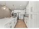 Open-concept kitchen with a large island and stainless steel appliances at 3319 S Osprey Ave, Sarasota, FL 34239