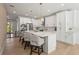 Well-lit kitchen showcasing a center island with barstool seating at 3319 S Osprey Ave, Sarasota, FL 34239