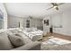 Bright living room featuring a large sectional sofa, wet bar, and modern decor at 3319 S Osprey Ave, Sarasota, FL 34239
