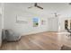 Bright office space with hardwood floors, ceiling fans, and ample natural light at 3319 S Osprey Ave, Sarasota, FL 34239
