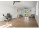Bright and airy home office space with hardwood floors and access to a balcony at 3319 S Osprey Ave, Sarasota, FL 34239