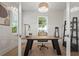 Bright home office with natural light, modern desk, and neutral decor at 3319 S Osprey Ave, Sarasota, FL 34239