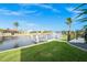 This backyard features a private boat dock, and canal access, perfect for waterfront living at 360 Capri Isles Ct, Punta Gorda, FL 33950