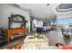 Spacious living room featuring stylish decor, an open layout, and hardwood floors at 360 Capri Isles Ct, Punta Gorda, FL 33950