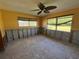 Bright bedroom with two windows and a ceiling fan at 3717 Sleepy Hollow Ln, Punta Gorda, FL 33950